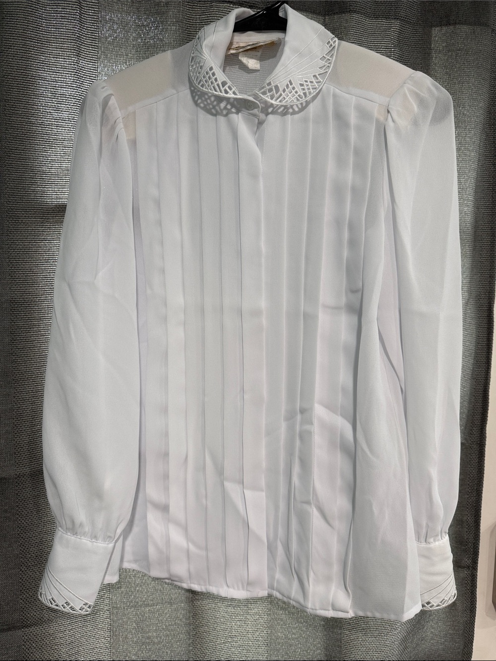 White Pleated Long-Sleeve Blouse with Decorative Cutout Collar